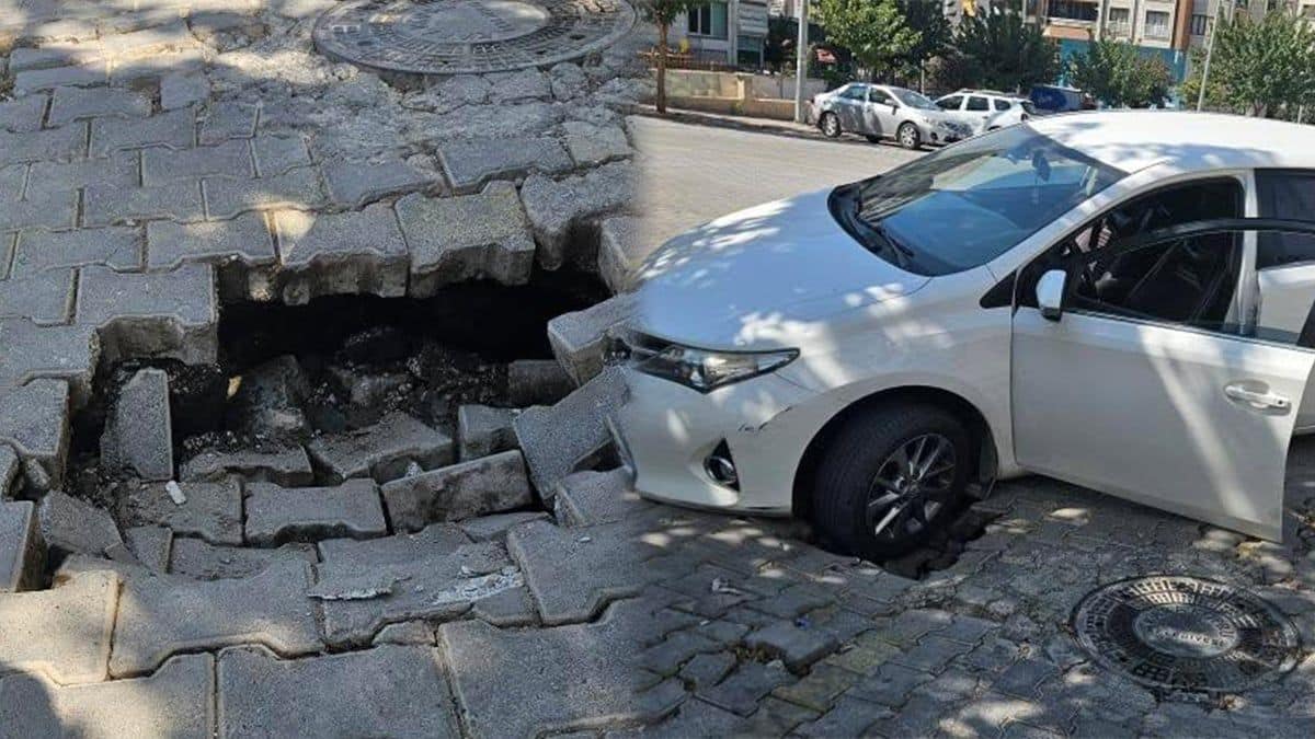 Seyir halindeki araç çökme sırasında zarar gördü, mahalleli tepki gösterdi.